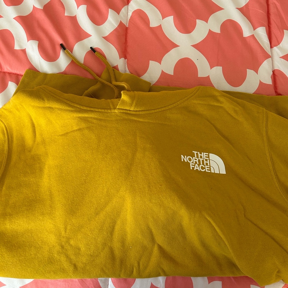 Men’s dark yellow North Face hoodie